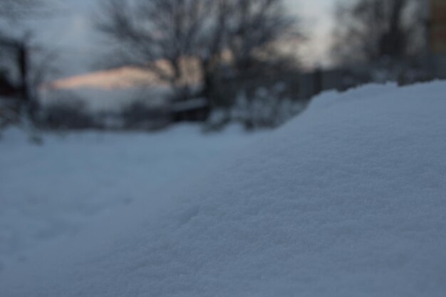 Snow drifts in winter in the village