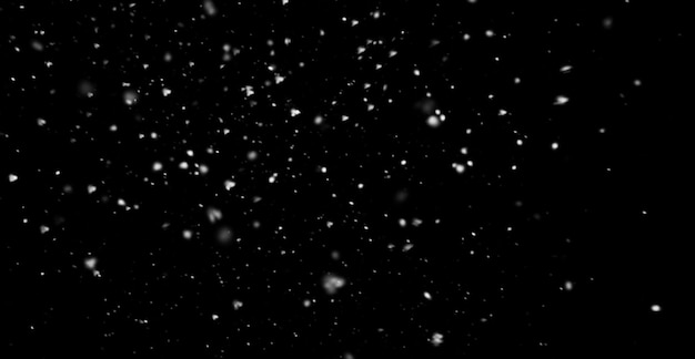 Photo snow falling on a black background