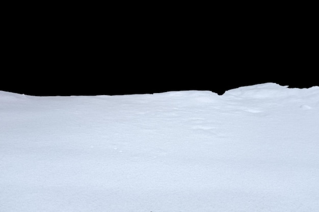 snow isolated on a black background. winter design element. high quality photo