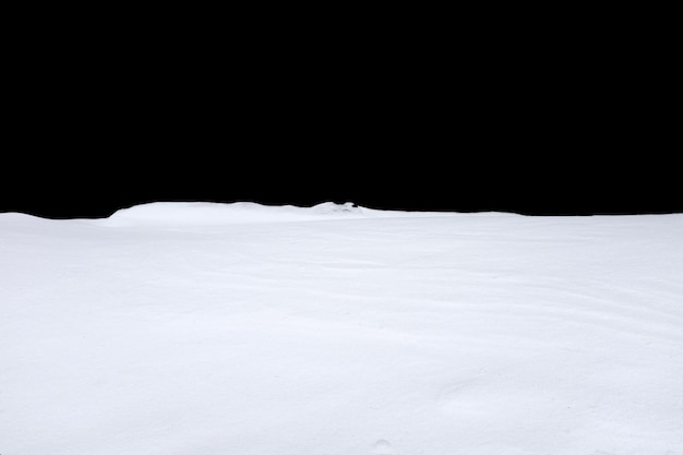 Snow isolated on a black background. winter design element. High quality photo