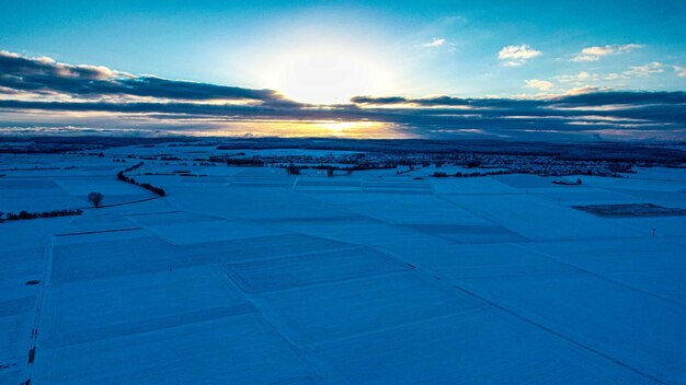 Snow landscape with sunrise