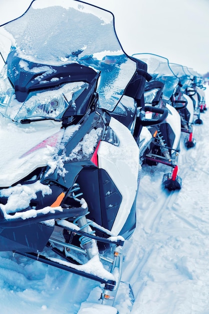 Snow mobiles in the frozen lake at winter Rovaniemi, Lapland, Finland