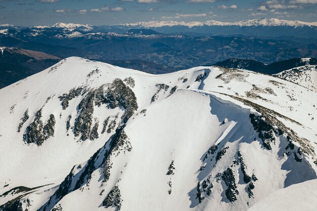 Snow in the mountains and blue sky, spring. High quality photo