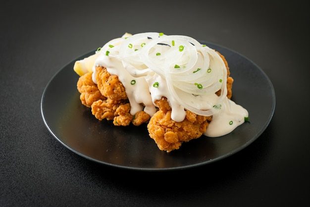 Snow Onion Chicken or Fried Chicken with Creamy Onions Sauce with Lemon in Korean style - Korean food style