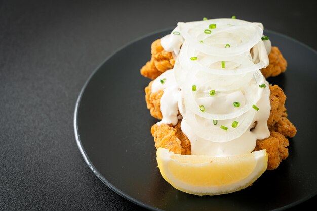 Snow Onion Chicken or Fried Chicken with Creamy Onions Sauce with Lemon in Korean style - Korean food style