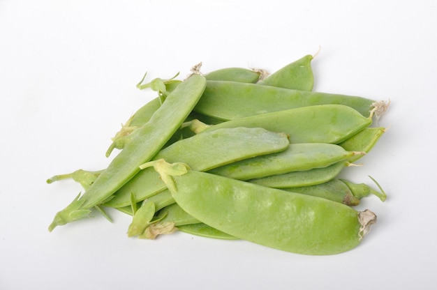 Snow peas on white background