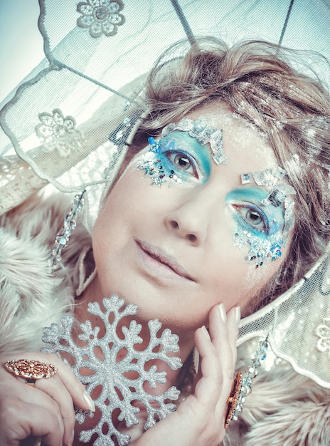 Snow Queen over white background.