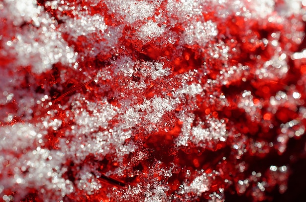 Snow on red glass