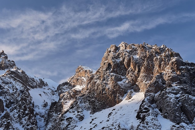 Snow Rocky Mountains with Blue Sky in Kazakhstan