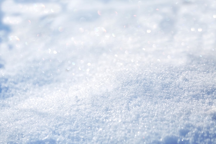 Photo 雪の表面。冬背景をぼかした写真