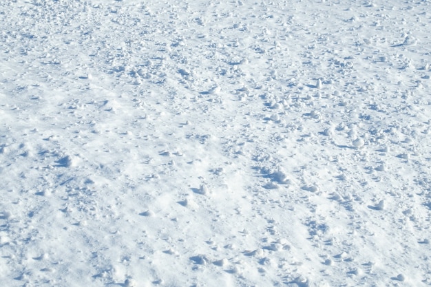 雪のテクスチャまたは冬の白い背景