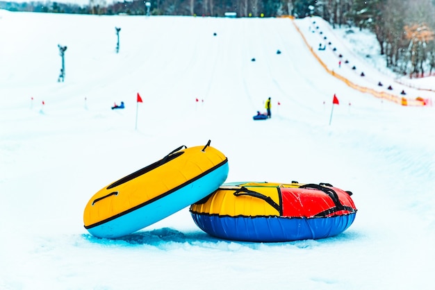 Snow tubing rings close up. hill on background. winter family leisure