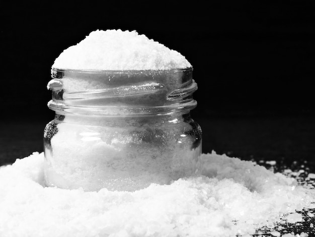 Snow white salt in a jar.