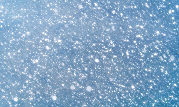 снег зима боке свечение синий фон на Рождество обои плакат дизайн баннера