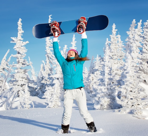 Photo snowboard girl winter ski resort