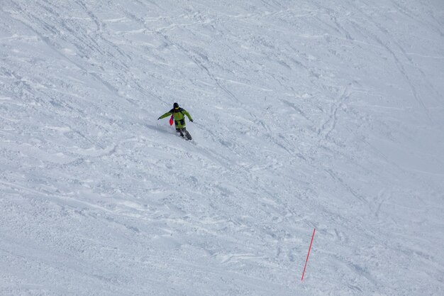 Snowboarder at free ride slope