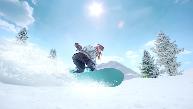 Photo snowboarder girl in action extreme winter sports