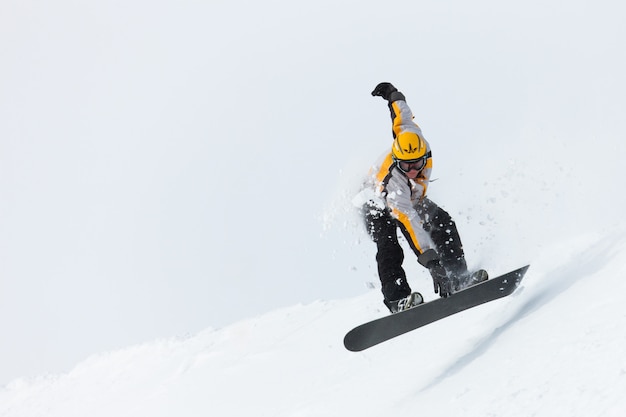 Snowboarder jumping