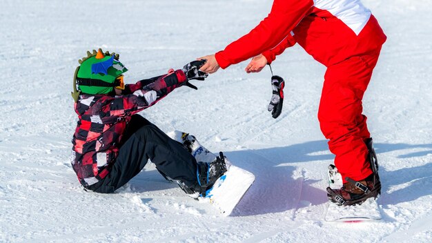 Foto lezione di snowboard