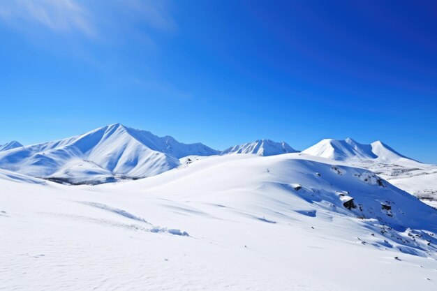 Snowcovered mountain under clear blue sky