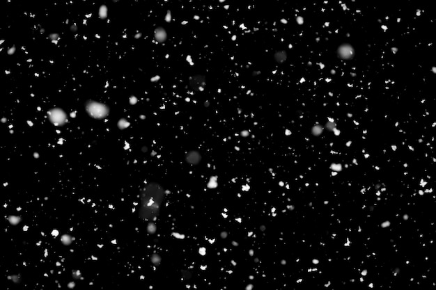 Snowfall on black background design element