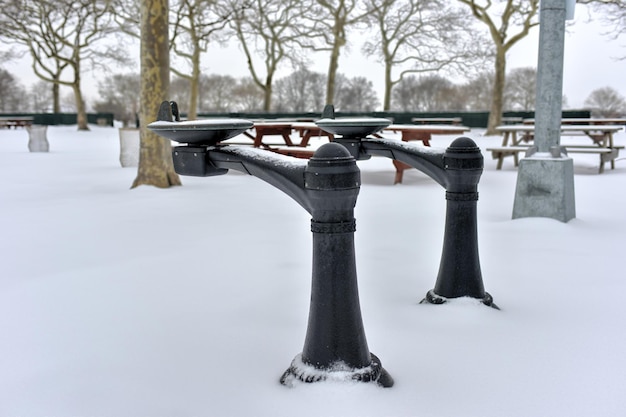 Photo snowfilled water fountain following a winter storm