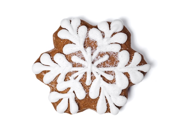 Photo snowflake from ginger biscuits on white background