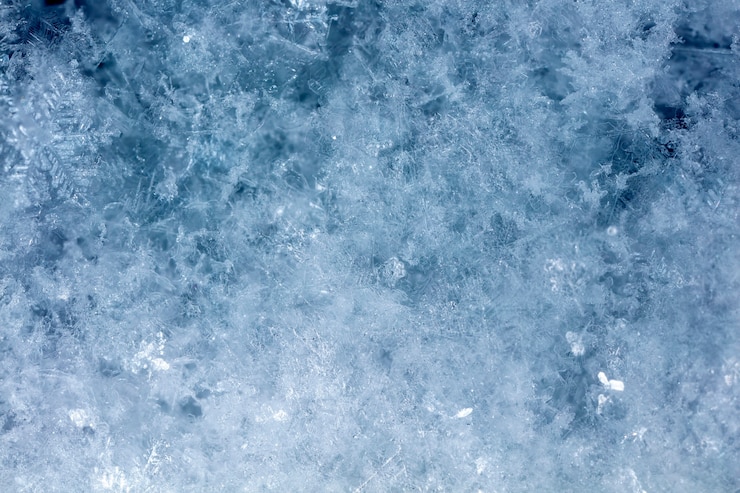 Photo snowflake on snow winter holidays and christmas background
