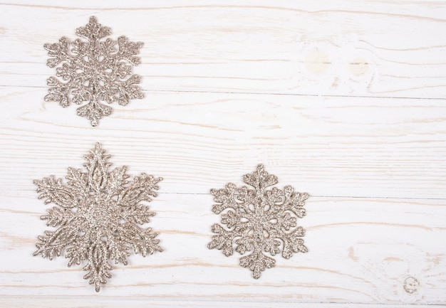 Snowflakes as Christmas decorations on white 