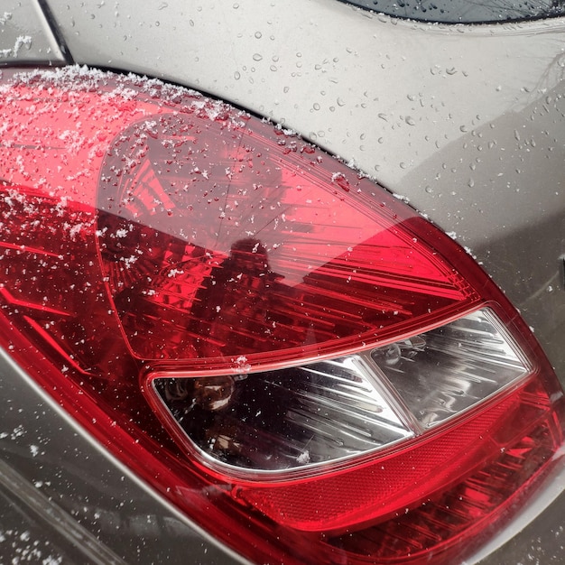 Photo snowflakes on a cars taillight