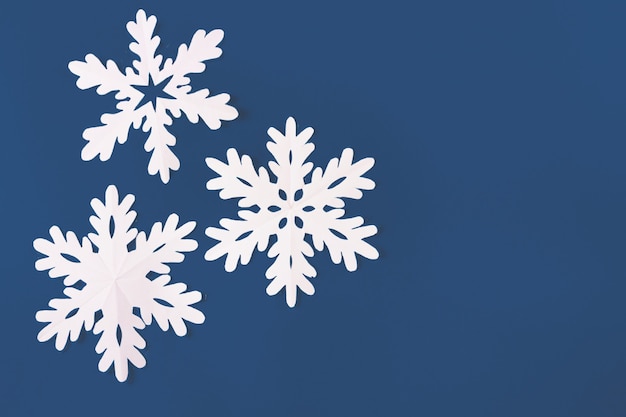 Photo snowflakes on dark blue background