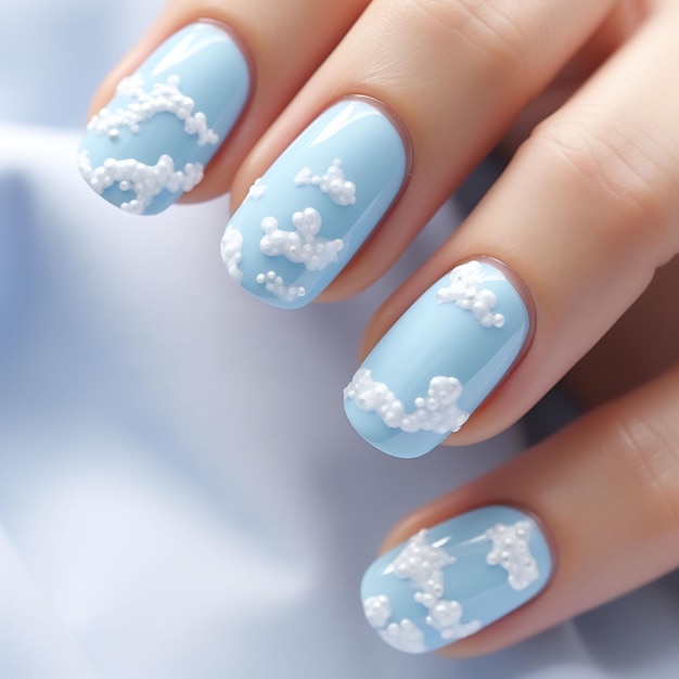 snowflakes on the nails of a woman's nails