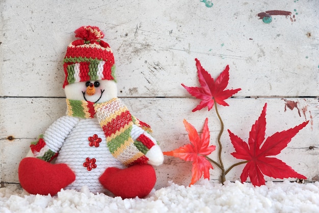 snowman sitting on snow in japan