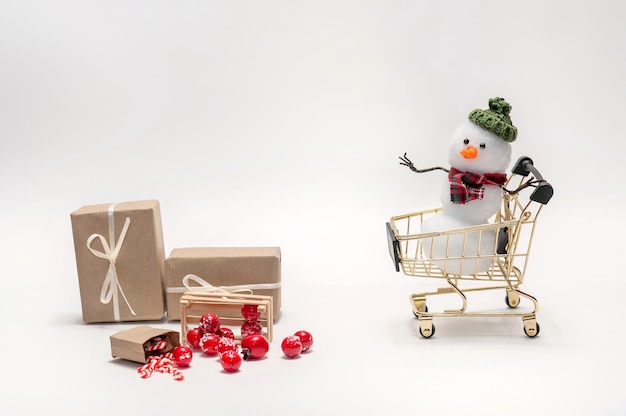 Snowmen are shopping gifts for christmas.