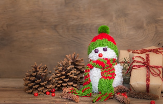 Snowmen made with wool pompoms