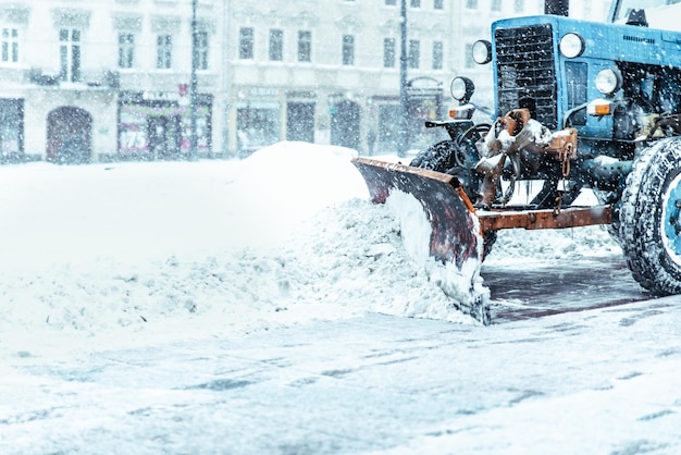 Snowplow close up cleaning street of snow concept