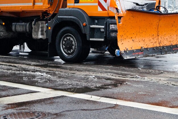 Snowplow on road during winter