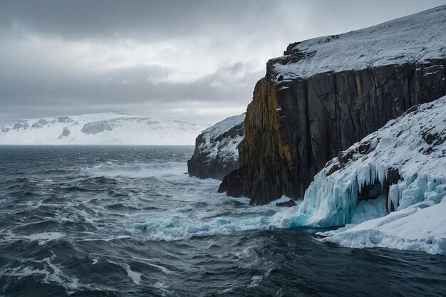 Photo snowy cliffs rising above a frigid sea