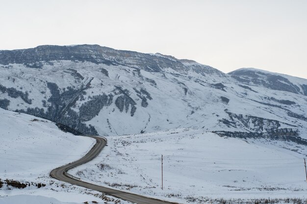 Snowy mountain and hills Winter mountain landscape