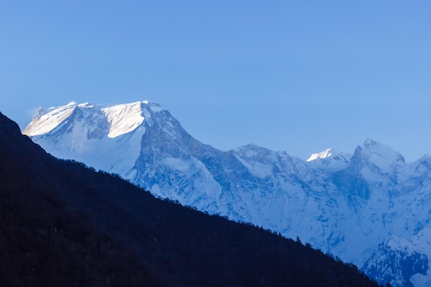 Snowy mountain peaks at dawn in the Himalayas Manaslu region