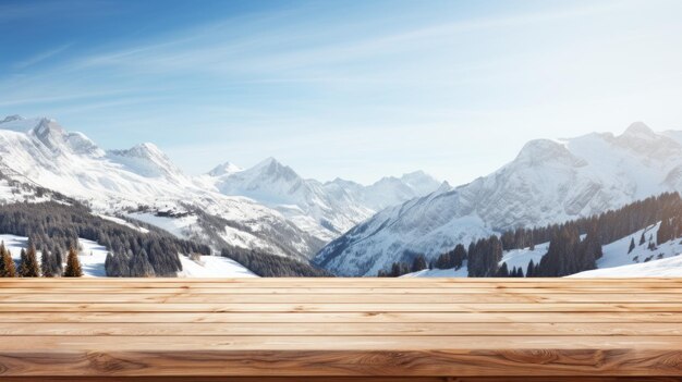 写真 木製のテーブルから見た雪の山脈