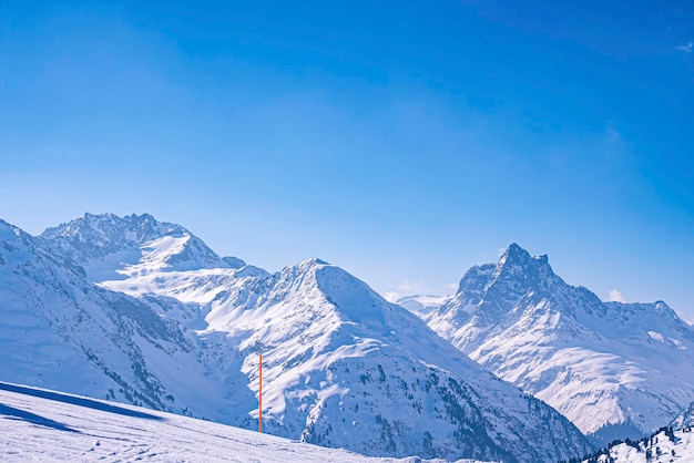 Snowy rocky mountain range during cold winter season