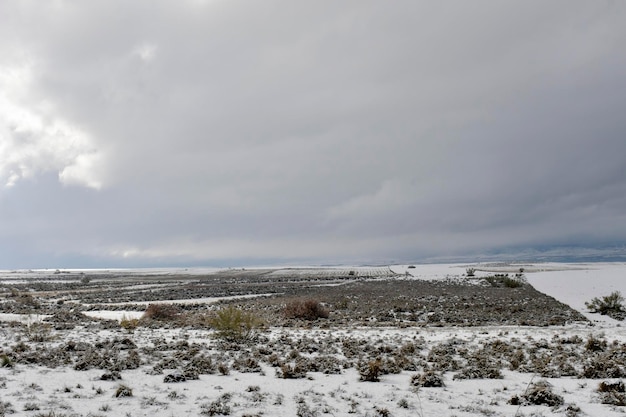 Snowy steppe fields in granada