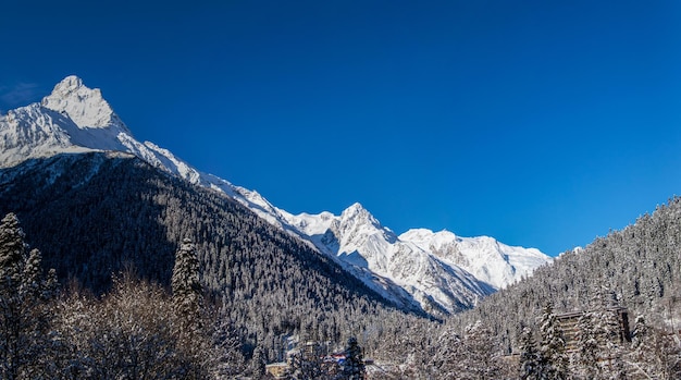 Snowy valley between the mountains of the Caucasus