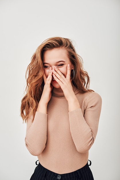 So happy funny cute smiling woman beautiful laughing girl  standing isolated over white background