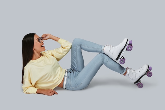 Young And Beautiful Indian Woman In Her Thirties Wearing Stylish Black  Topper Revealing Her Shoulder In A Sitting Pose Against White Background  Stock Photo - Download Image Now - iStock