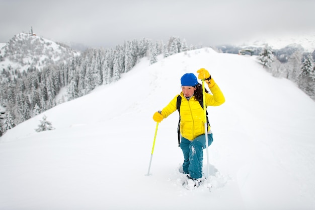 So much snow during a snowshoe walk of a lonely girl in the mountains