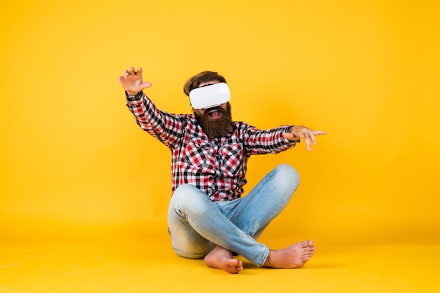 So real future technology concept visual reality concept guy\
getting experience using vrheadset glasses bearded hipster use\
modern technology man with glasses of virtual reality