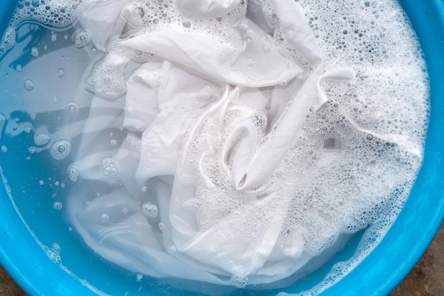 Soak a cloth before washing white cloth