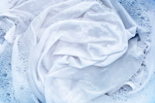 Soak a cloth before washing, white cloth